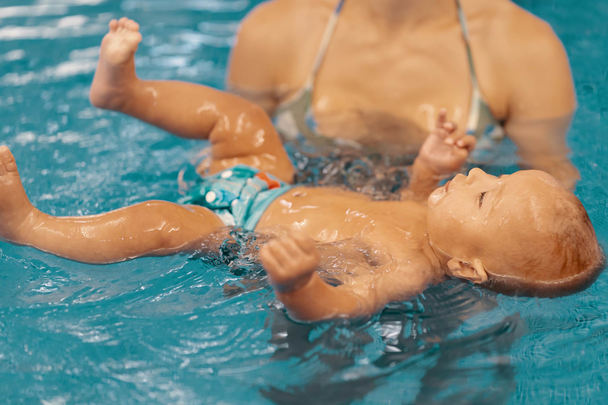 Toddler building water confidence in Vancouver swim lesson